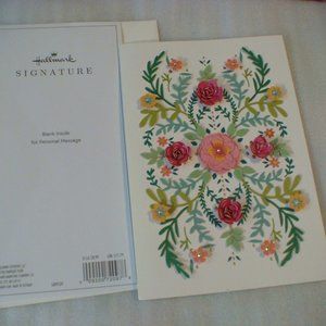 FREE  premium $9  Hallmark card with purchase of $65